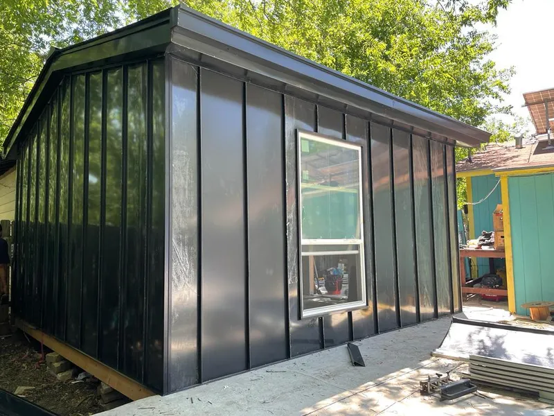 Black standing seam metal wall panels for Roof Inspection in Moundsville